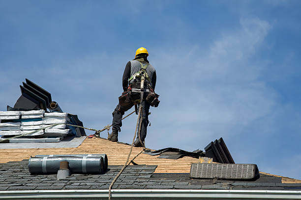Professional Gutter Installation technician working in Roggen, CO